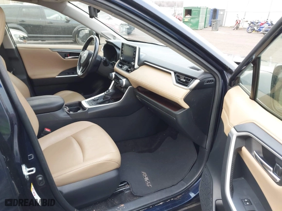 2019 Toyota RAV4 Limited with VIN JTMN1RFV4KD501124, listed as a IAAI auction lot 41510377 with 95,114 mi miles. Bid and sale history available at carsss.com. Image 5.