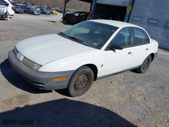 1999 Saturn SL with VIN 1G8ZH5282XZ178928, listed as a IAAI auction lot 41758412 with 249,418 mi miles. Bid and sale history available at carsss.com. Image 2.
