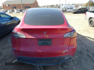 2023 Tesla Model Y Long Range with VIN 7SAYGDEE8PF709459, listed as a IAAI auction lot 41334108 with 51,544 mi miles. Bid and sale history available at carsss.com. Image 15.