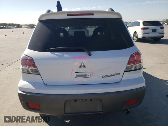 2003 Mitsubishi Outlander XLS with VIN JA4LX41G63U060724, listed as a Copart auction lot 75613604 with 51,058 mi miles and Salvage Title. Bid and sale history available at carsss.com. Image 6.