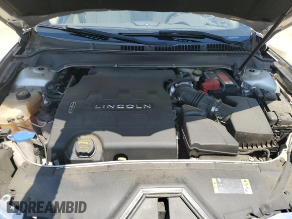 2013 Lincoln MKZ z VIN 3LN6L2GK5DR803943, wystawiony jako Copart lot #51714625 z przebiegiem 108 958 mil mil oraz Szkoda całkowita • Salvage title. Historia ofert i sprzedaży dostępna na DreamBid. Obrazek 12.