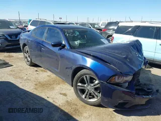 2014 Dodge Charger SXT with VIN 2C3CDXJGXEH255123, listed as a IAAI auction lot 41679977 with 153,032 mi miles. Bid and sale history available at carsss.com. Image 1.