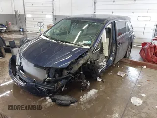 2015 Honda Odyssey EX with VIN 5FNRL5H42FB114840, listed as a IAAI auction lot 41586407 with 92,490 mi miles. Bid and sale history available at carsss.com. Image 2.