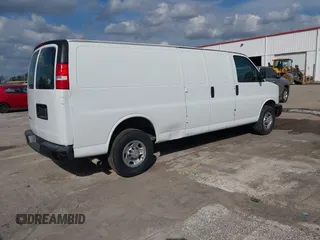 2020 Chevrolet Express Cargo Van with VIN 1GCWGBFP7L1149607, listed as a IAAI auction lot 41519575 with 82,940 mi miles. Bid and sale history available at carsss.com. Image 4.