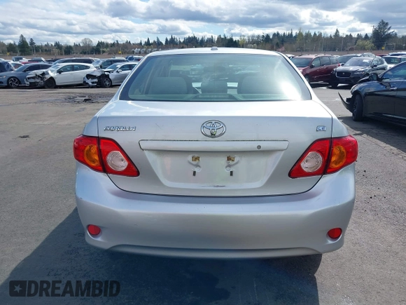 2009 Toyota Corolla with VIN JTDBL40E59J051651, listed as a IAAI auction lot 41874710 with 52,938 mi miles. Bid and sale history available at carsss.com. Image 16.