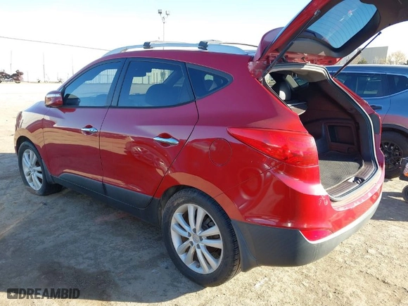 2013 Hyundai Tucson GLS with VIN KM8JU3AC3DU580695, listed as a IAAI auction lot 41761358 with 187,630 mi miles. Bid and sale history available at carsss.com. Image 3.