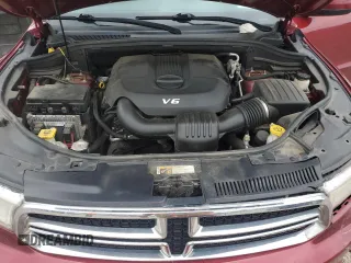 2015 Dodge Durango SXT with VIN 1C4RDJAG8FC147543, listed as a Copart auction lot 65713485 with 209,010 mi miles and Salvage title. Bid and sale history available at DreamBid. Image 12.