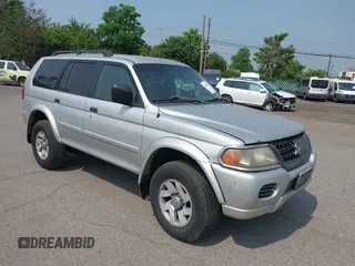 2003 Mitsubishi Montero XLS z VIN JA4MT31R33J048723, wystawiony jako IAAI lot #42439332 z przebiegiem 185 593 mil mil oraz . Historia ofert i sprzedaży dostępna na DreamBid. Obrazek 1.