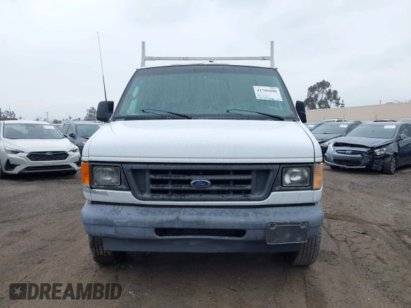2003 Ford Econoline Cargo with VIN 1FTNE24L73HA28455, listed as a IAAI auction lot 41709698 with 315,395 mi miles and . Bid and sale history available at carsss.com. Image 11.