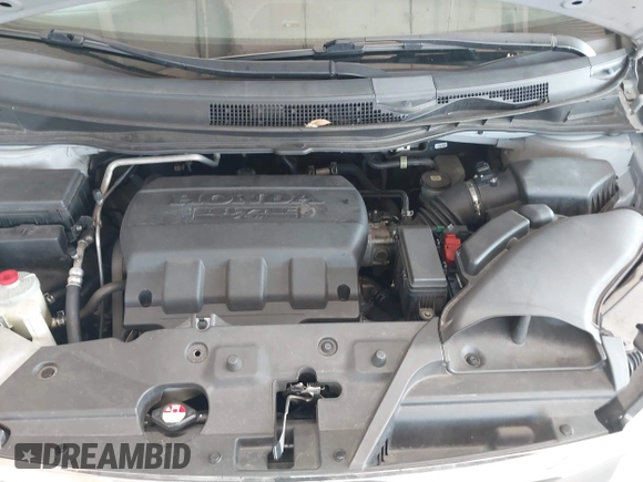 2012 Honda Odyssey EX-L with VIN 5FNRL5H67CB005013, listed as a IAAI auction lot 42295586 with 200,611 mi miles and . Bid and sale history available at DreamBid. Image 10.