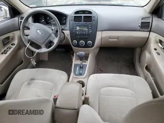2009 Kia Spectra EX with VIN KNAFE221795600329, listed as a Copart auction lot 49205774 with 251,191 mi miles and Salvage Title. Bid and sale history available at carsss.com. Image 8.