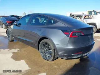 2018 Tesla Model 3 Long Range Battery with VIN 5YJ3E1EA8JF010834, listed as a IAAI auction lot 41598099 with 83,252 mi miles. Bid and sale history available at carsss.com. Image 3.