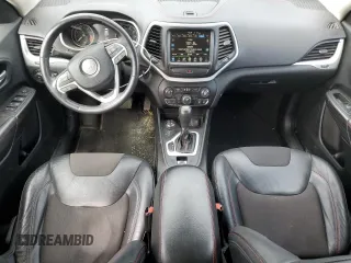2015 Jeep Cherokee Trailhawk with VIN 1C4PJMBSXFW545534, listed as a Copart auction lot 62236885 with 148,448 mi miles and Clean title. Bid and sale history available at DreamBid. Image 8.