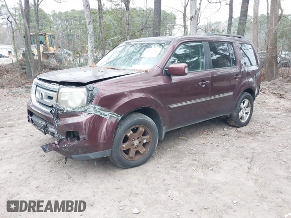 2010 Honda Pilot Touring with VIN 5FNYF4H9XAB040715, listed as a IAAI auction lot 41807334 with 262,786 mi miles and . Bid and sale history available at carsss.com. Image 2.