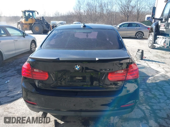 2015 BMW 3 Series 328i with VIN WBA3C1C53FK120984, listed as a IAAI auction lot 41338035 with 119,486 mi miles and . Bid and sale history available at carsss.com. Image 16.