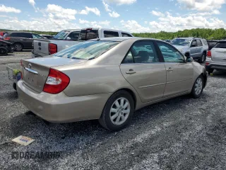 2004 Toyota Camry LE z VIN 4T1BF32K94U571035, wystawiony jako Copart lot #56749935 z przebiegiem 136 361 mil mil oraz Szkoda całkowita • Salvage title. Historia ofert i sprzedaży dostępna na DreamBid. Obrazek 3.