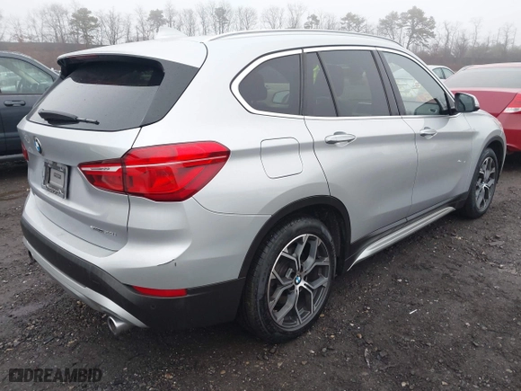 2021 BMW X1 xDrive28i with VIN WBXJG9C04M5T79810, listed as a IAAI auction lot 41471536 with 75,345 mi miles. Bid and sale history available at carsss.com. Image 4.