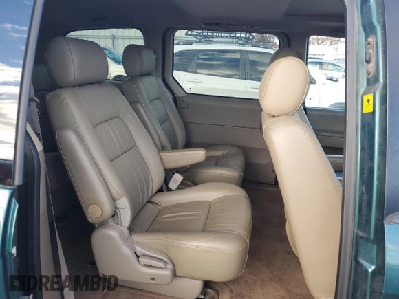 2002 Kia Sedona LX with VIN KNDUP131426217512, listed as a Copart auction lot 80928774 with 163,176 mi miles and Salvage Title. Bid and sale history available at carsss.com. Image 11.
