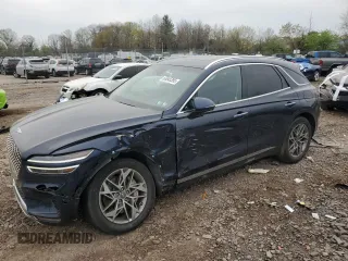 2023 Genesis GV70 2.5T z VIN KMUMADTB9PU096262, wystawiony jako Copart lot #53645395 z przebiegiem 26 663 mil mil oraz Szkoda całkowita • Salvage title. Historia ofert i sprzedaży dostępna na DreamBid. Obrazek 1.