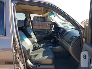 2005 Mazda Tribute S with VIN 4F2CZ06175KM49643, listed as a IAAI auction lot 41397843 with 185,088 mi miles and . Bid and sale history available at carsss.com. Image 5.