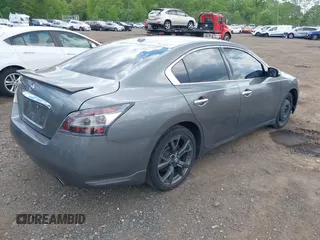 2014 Nissan Maxima S with VIN 1N4AA5AP9EC432415, listed as a IAAI auction lot 42230164 with 149,080 mi miles and . Bid and sale history available at DreamBid. Image 4.