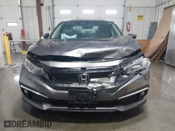 2020 Honda Civic EX-L with VIN 19XFC1F70LE010163, listed as a IAAI auction lot 41306532 with 88,767 mi miles and . Bid and sale history available at DreamBid. Image 12.