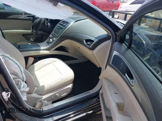 2017 Lincoln MKZ Premiere z VIN 3LN6L5A95HR648064, wystawiony jako IAAI lot #42115558 z przebiegiem 86 701 mil mil oraz . Historia ofert i sprzedaży dostępna na DreamBid. Obrazek 5.