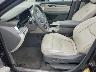 2018 Cadillac XT5 Premium Luxury FWD z VIN 1GYKNERS5JZ127703, wystawiony jako Copart lot #58315215 z przebiegiem Nie podano mil oraz Szkoda całkowita • Salvage title. Historia ofert i sprzedaży dostępna na DreamBid. Obrazek 7.