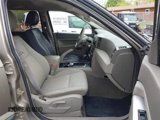 2005 Jeep Grand Cherokee Laredo with VIN 1J4GR48K35C510327, listed as a IAAI auction lot 42026081 with 260,377 mi miles. Bid and sale history available at carsss.com. Image 5.