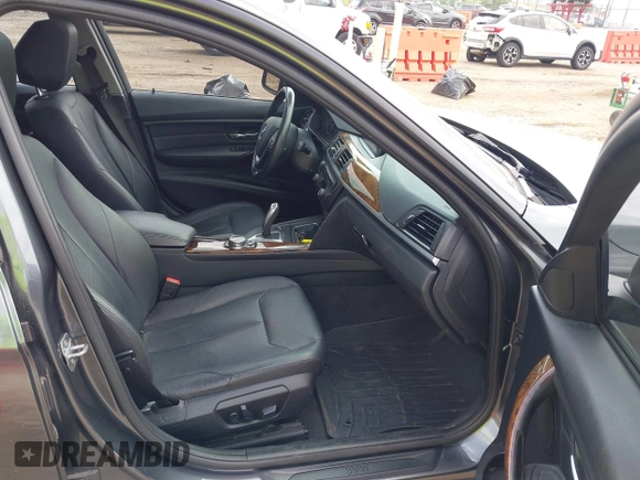 2014 BMW 3 Series 328i xDrive with VIN WBA3B3C55EJ977584, listed as a IAAI auction lot 42805585 with 135,855 mi miles and . Bid and sale history available at DreamBid. Image 5.