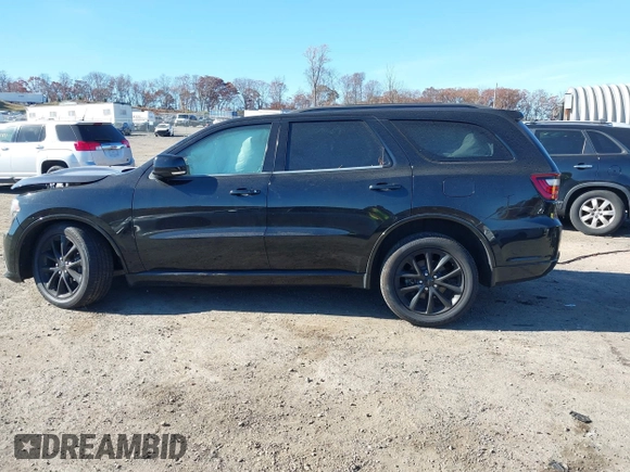 2018 Dodge Durango GT with VIN 1C4RDJDG5JC386634, listed as a IAAI auction lot 40703454 with 79,348 mi miles and . Bid and sale history available at DreamBid. Image 14.