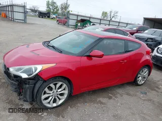 2013 Hyundai Veloster w/Gray Int z VIN KMHTC6AD8DU146035, wystawiony jako IAAI lot #41892703 z przebiegiem 241 169 mil mil oraz . Historia ofert i sprzedaży dostępna na DreamBid. Obrazek 16.
