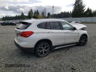 2016 BMW X1 xDrive28i with VIN WBXHT3C39G5E55496, listed as a Copart auction lot 49460233 with 37,934 mi miles. Bid and sale history available at carsss.com. Image 3.