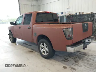 2007 Nissan Titan XE with VIN 1N6BA07A57N233449, listed as a IAAI auction lot 41381833 with 176,720 mi miles. Bid and sale history available at carsss.com. Image 3.