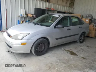 2003 Ford Focus LX с VIN 1FAFP33P03W151976, выставлен на аукционе Copart как лот 60719315 с пробегом 175 020 миль миль и Чистый • Clean title. История ставок и продаж доступна на DreamBid. Изображение 1.