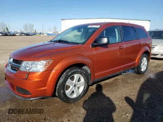 2013 Dodge Journey American Value with VIN 3C4PDCAB4DT590975, listed as a Copart auction lot 55627725 with 212,659 mi miles and Clean Title. Bid and sale history available at DreamBid. Image 1.