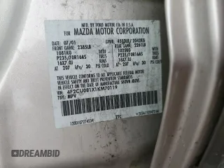 2001 Mazda Tribute LX with VIN 4F2CU081X1KM70119, listed as a Copart auction lot 89311935 with 176,851 mi miles and Salvage Title. Bid and sale history available at DreamBid. Image 13.