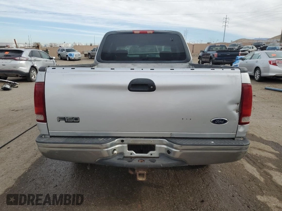 2002 Ford F-150 XL z VIN 1FTRX17W52NA62115, wystawiony jako Copart lot #50415375 z przebiegiem 145 361 mil mil oraz Szkoda całkowita • Salvage title. Historia ofert i sprzedaży dostępna na DreamBid. Obrazek 6.