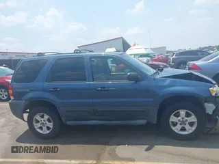 2006 Ford Escape XLT z VIN 1FMCU93156KB10612, wystawiony jako IAAI lot #42583417 z przebiegiem 133 615 mil mil oraz . Historia ofert i sprzedaży dostępna na DreamBid. Obrazek 13.