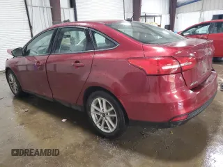 2017 Ford Focus SE with VIN 1FADP3F26HL209475, listed as a Copart auction lot 58416185 with 71,318 mi miles and Salvage title. Bid and sale history available at DreamBid. Image 2.
