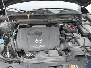2017 Mazda CX-5 Grand Touring with VIN JM3KFBDL6H0179557, listed as a IAAI auction lot 41546493 with 103,585 mi miles. Bid and sale history available at carsss.com. Image 10.