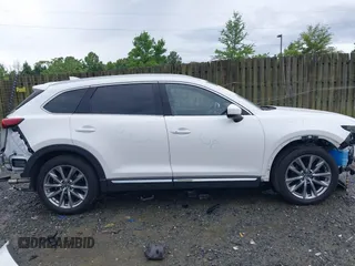 2019 Mazda CX-9 Signature with VIN JM3TCBEY6K0307102, listed as a IAAI auction lot 42645716 with 55,299 mi miles and . Bid and sale history available at DreamBid. Image 14.