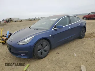 2018 Tesla Model 3 Long Range Battery z VIN 5YJ3E1EA4JF032586, wystawiony jako Copart lot #58831225 z przebiegiem 73 120 mil mil oraz Szkoda całkowita • Salvage title. Historia ofert i sprzedaży dostępna na DreamBid. Obrazek 1.