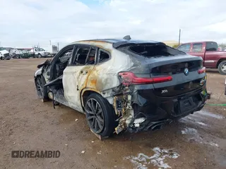 2024 BMW X4 M40i with VIN 5UX43DT03R9V02312, listed as a IAAI auction lot 41042724 with 1 mi miles. Bid and sale history available at carsss.com. Image 3.