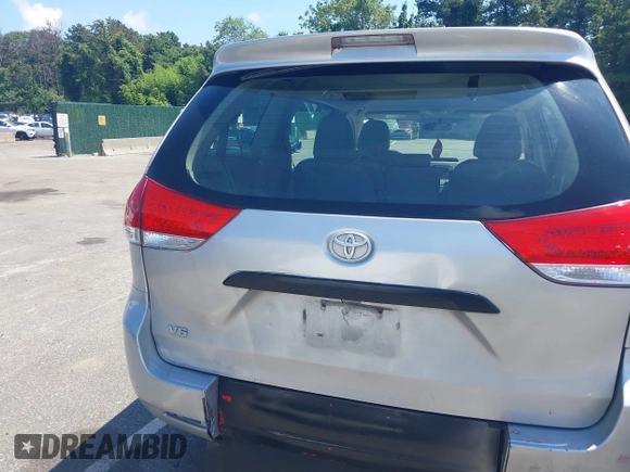 2014 Toyota Sienna L with VIN 5TDZK3DC9ES518653, listed as a IAAI auction lot 42767591 with 261,730 mi miles and . Bid and sale history available at DreamBid. Image 16.