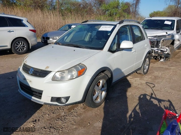 2007 Suzuki SX4 Man Touring Pkg AWD with VIN JS2YB417075101171, listed as a IAAI auction lot 41982543 with 124,205 mi miles. Bid and sale history available at carsss.com. Image 2.