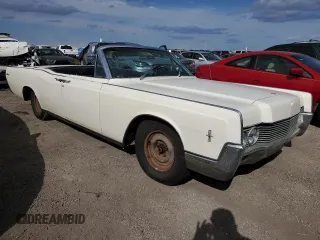 1966 Lincoln Continental with VIN 6Y86G414159, listed as a Copart auction lot 76480434 with 87,933 mi miles and Salvage Title. Bid and sale history available at DreamBid. Image 4.