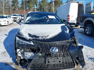2021 Lexus UX with VIN JTHR9JBH8M2037134, listed as a IAAI auction lot 41352890 with 56,198 mi miles. Bid and sale history available at carsss.com. Image 13.