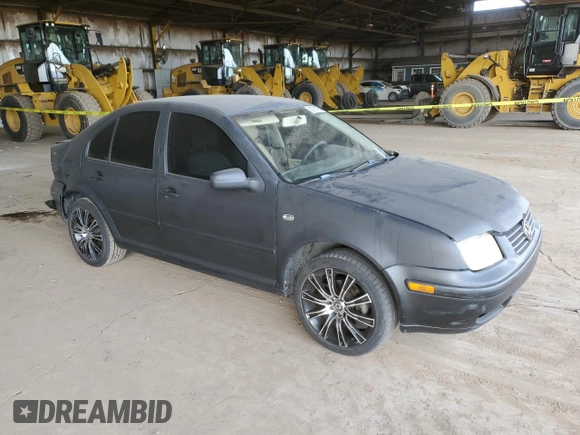 1999 Volkswagen Jetta GL z VIN 3VWRA29M7XM058584, wystawiony jako Copart lot #83714754 z przebiegiem 398 647 mil mil oraz Szkoda całkowita • Salvage title. Historia ofert i sprzedaży dostępna na DreamBid. Obrazek 4.