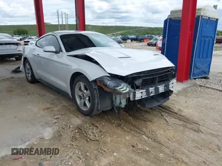 2018 Ford Mustang EcoBoost with VIN 1FA6P8TH4J5165145, listed as a IAAI auction lot 42414241 with 58,884 mi miles and . Bid and sale history available at DreamBid. Image 1.